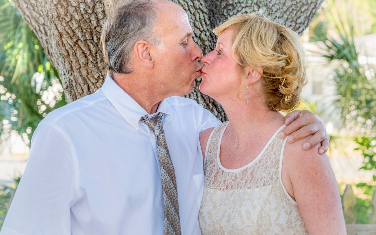 beach wedding, happy couple, sunset